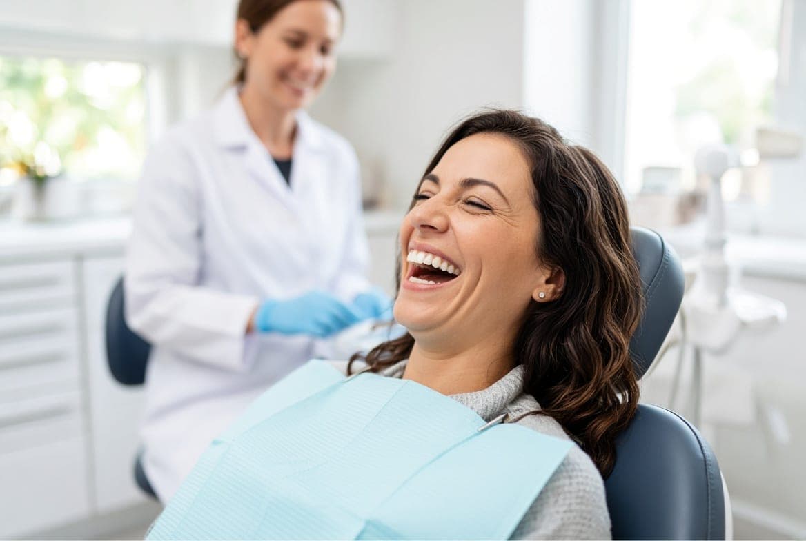 A smiling patient at a dental practice